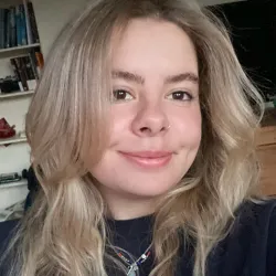 White woman with blonde hair smilin