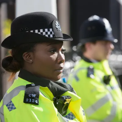 Two police officers - a black woman and a white man