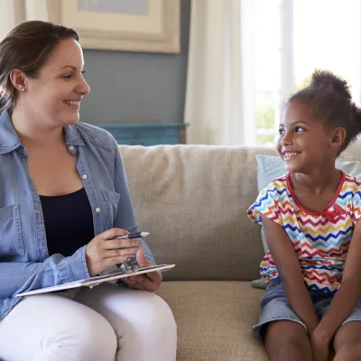 Support worker and child 