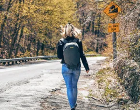 Women walking down a road